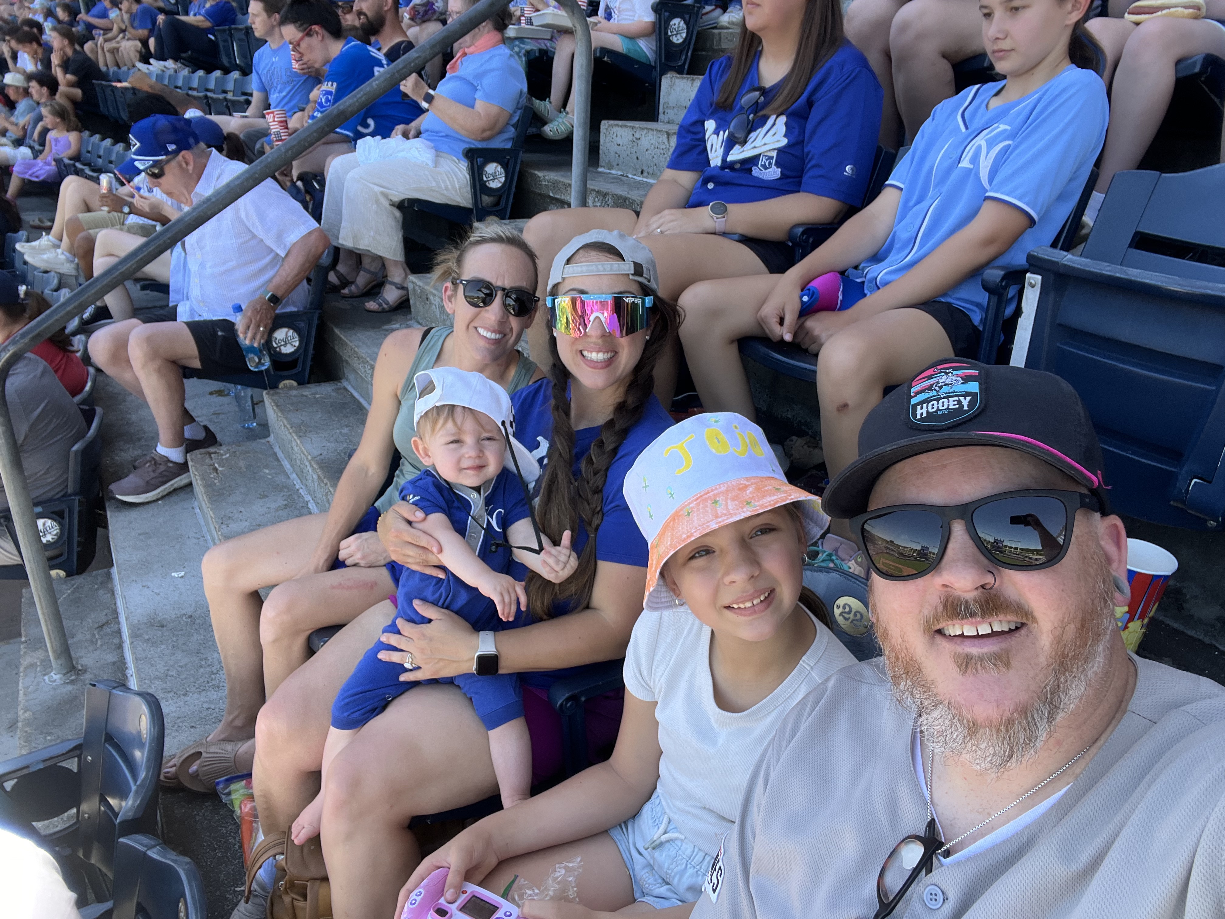 Cayla with her family at a Royals game
